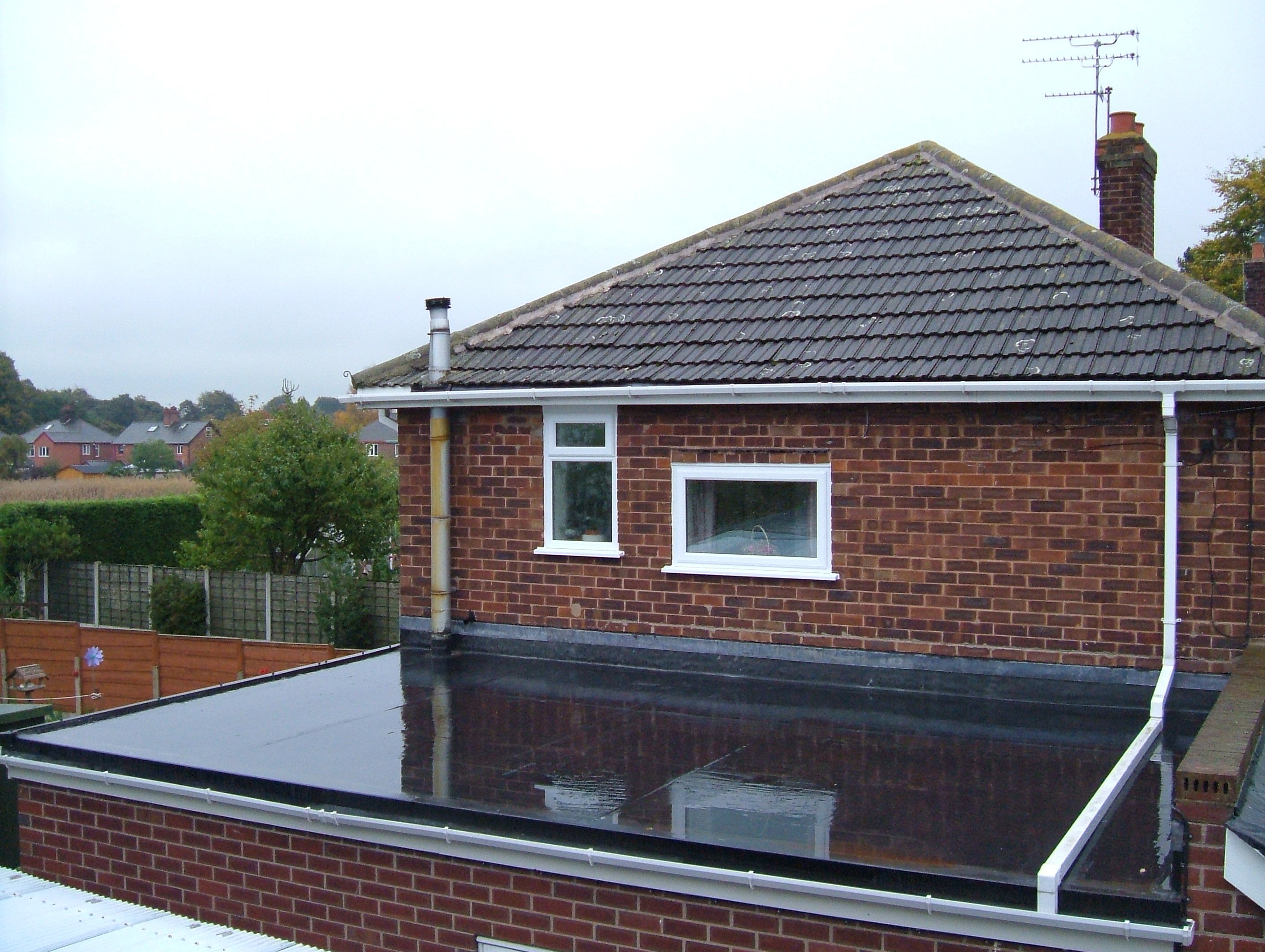 what kind of caulking sticks to rubber roofs